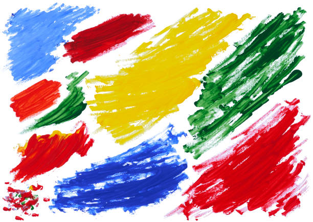 Various strokes of acrylic multicolored paint on an isolated background