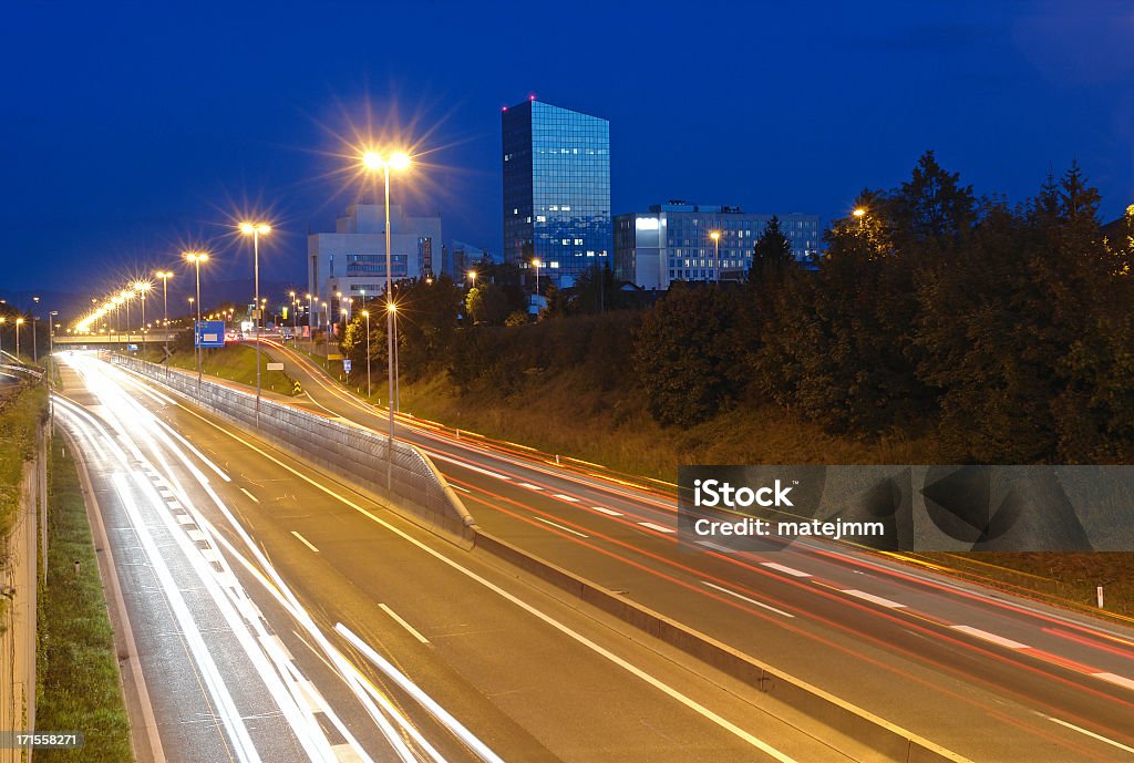 Autostrada di notte - Foto stock royalty-free di Affollato
