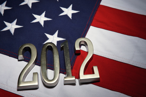 American presidential elections 2012 marked with silver numbers on textured American flag