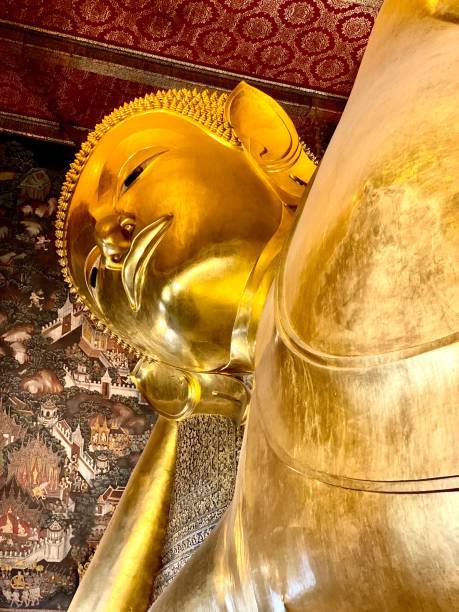 istock Golden reclining Buddha statute 1715612326