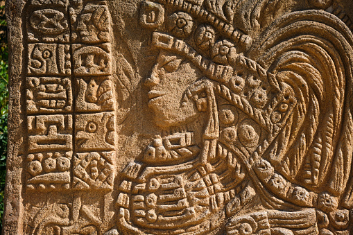 Salou, spain - May 20, 2022: Replica of a stone engraving of Moctezuma, king of the Mayan empire, in a decorative reproduction in a theme amusement park.