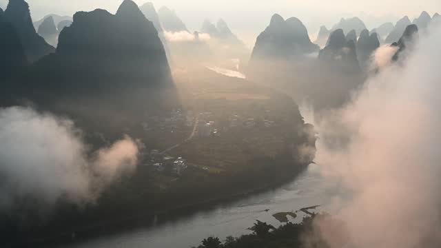 Magnificent sunrise-dawn over Lijiang River and peaks