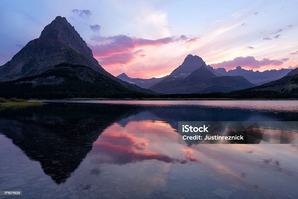 Lac Swiftcurrent coucher du soleil - Photo de Coucher de soleil libre de droits