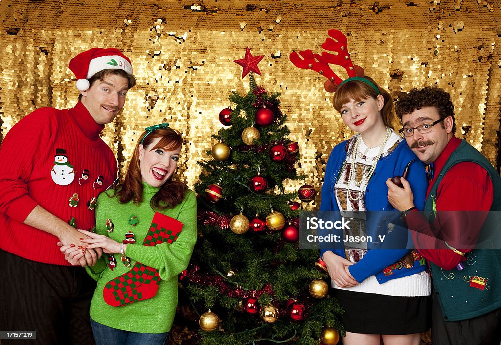 Couple at Christmas People with Ugly Christmas sweatersMy Awkward Christmas Lightbox Christmas Stock Photo
