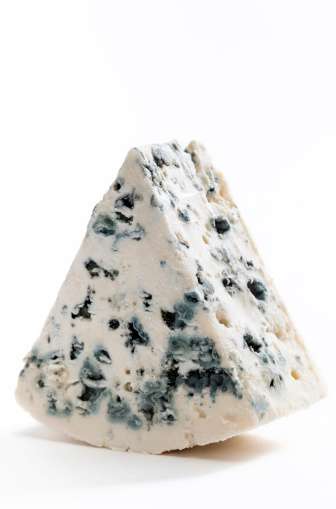 Piece of French Roquefort Cheese on White Background