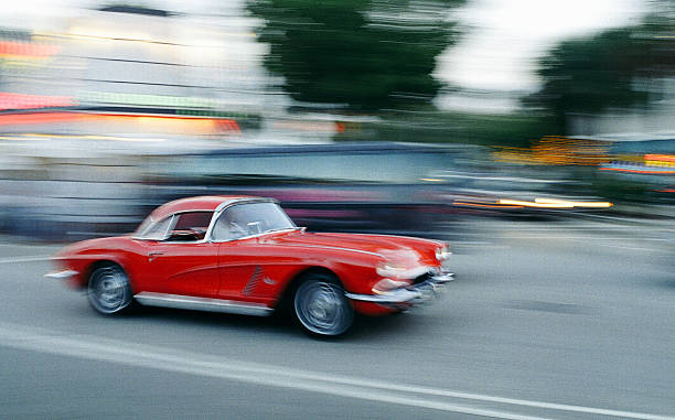 Corvette 1962 A beautifully restored classic Corvette (1962). The original American sports car, Cross-processed & strong grain added to create film atmosphere porsche classic sports car obsolete stock pictures, royalty-free photos & images