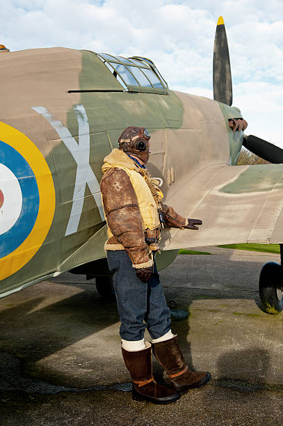 istock WW2 RAF Pilot With Hurricane Aircraft 171571597