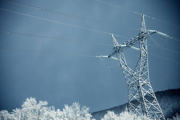 Electricit pylon  covered with snow