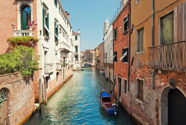 Venice is under the protection of UNESCO as a world heritage site. The historic city centre gets about 12 to 20 million tourists per year. Focus of picture is on the right side.
