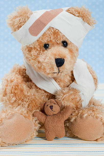 istock Suffering Sick Sweet Teddy Bear in Hospital 171571708