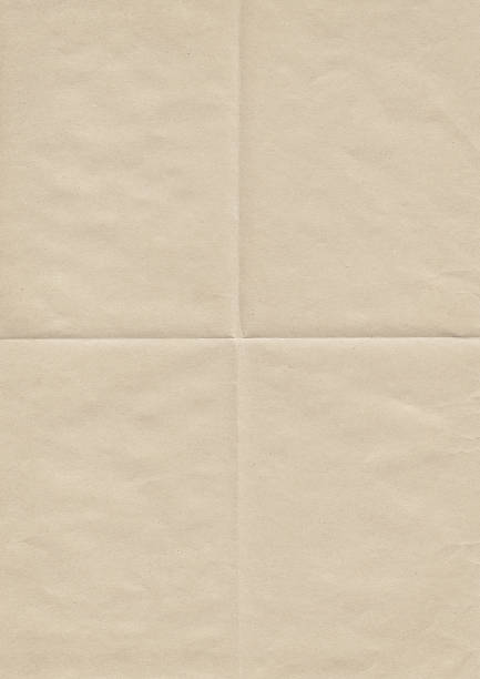 High Resolution Old Beige Paper Creased Grunge Texture stock photo