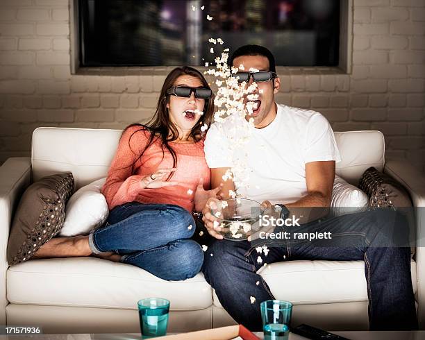 Yound Adults Watching A 3d Movie Stock Photo - Download Image Now - Movie, Television Set, Friendship