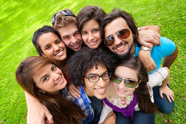 istock Multi-ethnics group of young students having fun at university campus 171572078