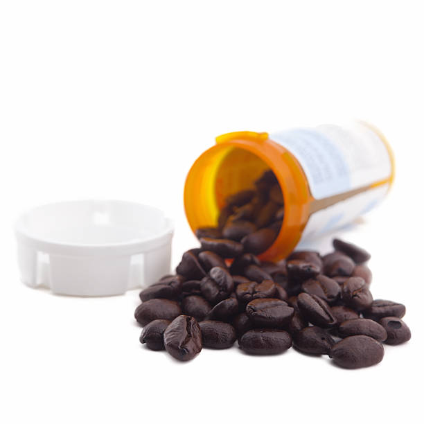 istock Spilled coffee Capsules from Prescription Bottle 171572123