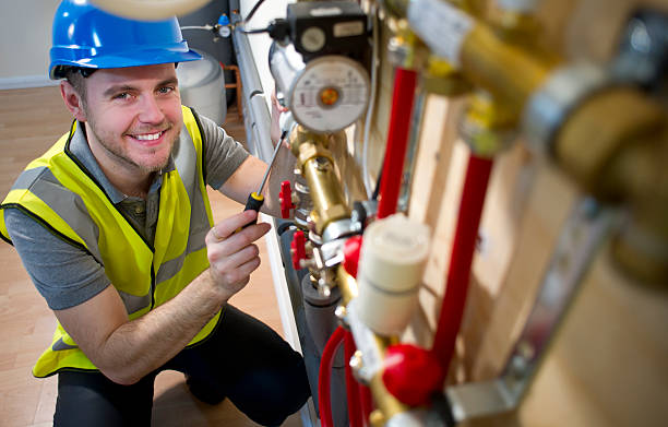 underfloor heating installation engineer installing underfloor heating system plumbing & heating stock pictures, royalty-free photos & images