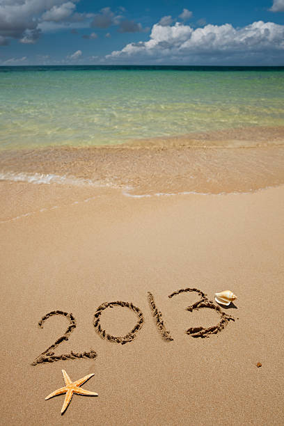 novembro de 2013 - 2013 beach sand new years day imagens e fotografias de stock