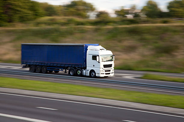 istock lorry at speed on English motorway 171572823