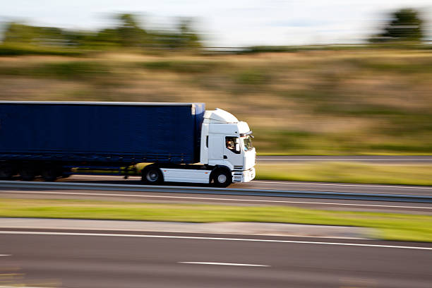 istock lorry at speed on English motorway 171572825