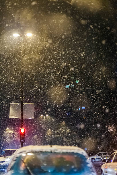 istock Traffic jam in heavy snow storm 171572898