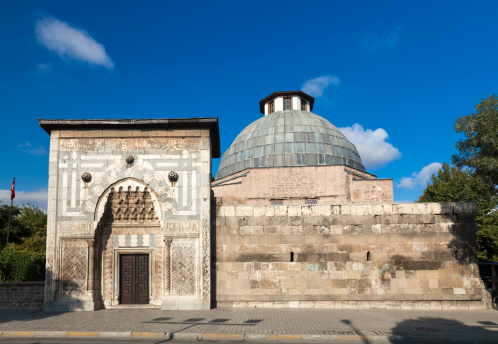 Turkey, Anatolia,  Byk Karatay MadrasaMadrasahMadrassa. View of the Byk Karatay madrasa madrasah madrassa. The madrasas madrassas built in Seljukian times were relatively small and had one Ivan only. They were either built around a dome covered courtyard or on a large scale with a longitudinal plan. The facade is crowned by a monumental calligraphy bearing the two color alfiz, which was widely used in the Aleppo region.