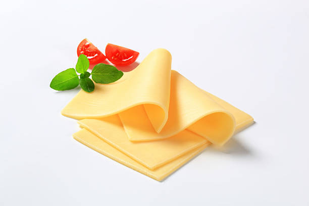 quatre tranches de fromage - yellow cheese thin portion photos et images de collection