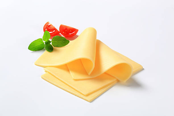 cztery plasterki sera - yellow cheese thin portion zdjęcia i obrazy z banku zdjęć