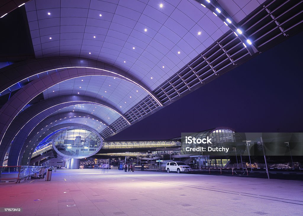 Illuminated Dubai International Airport at dusk, UAE Illuminated Dubai International Airport at dusk, UAE. High-end scan of 6x7cm transparency.View more related images in one of the following lightboxes: Airport Stock Photo