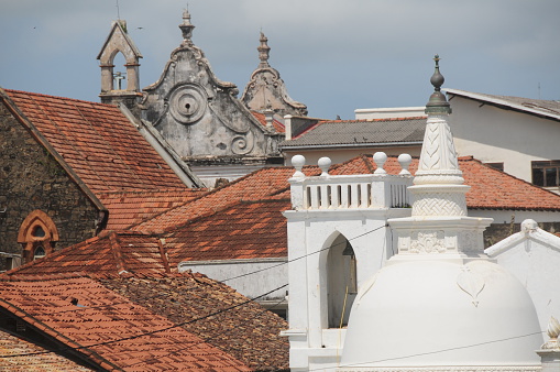 Telephoto image of view of buildings roofs from the Dutch colonial times.
