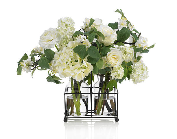 Apple blossom and rose bouquet on white background