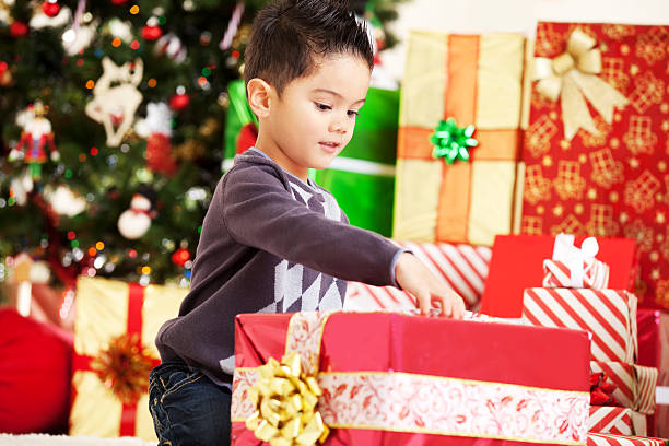istock Little Boy & Christmas Gifts 171573543