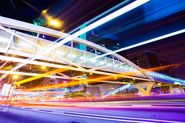 istock trail of traffic through street 171573768
