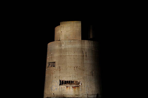 The Landes,WW2 radio tower,Jersey. Abstract telephoto image of WW2 German bunker at night.Painted with Torch/flash light for 30 sec using tripod. ww2 german bunker stock pictures, royalty-free photos & images