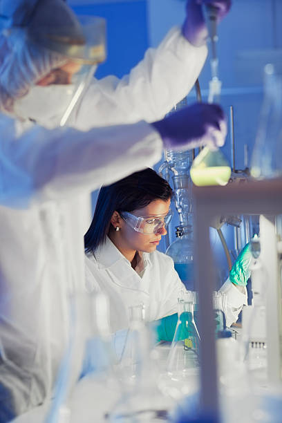 istock group of scientists working at the laboratory 171574235