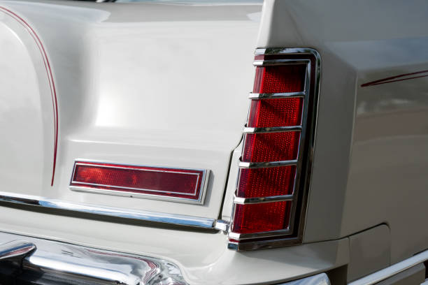 istock Retro 70's Rear Taillight on White Luxury Car 1715744539