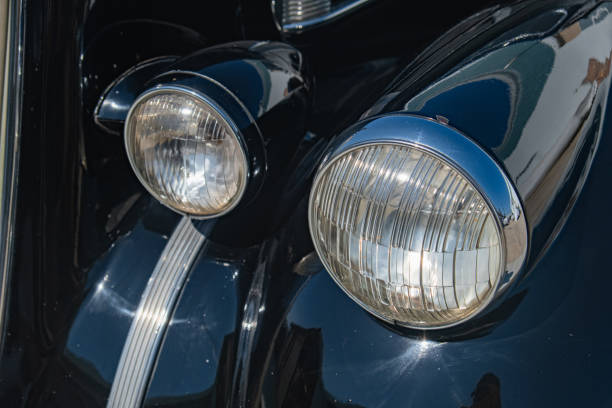 istock Vintage Car Headlights on Black Retro Vehicle 1715744846