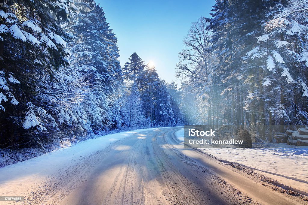 Curved country Road - Snowy Winter  Road Stock Photo
