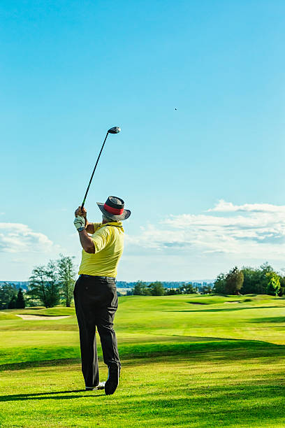 istock Senior Golfer on Golf Course Teeing Off 171574660