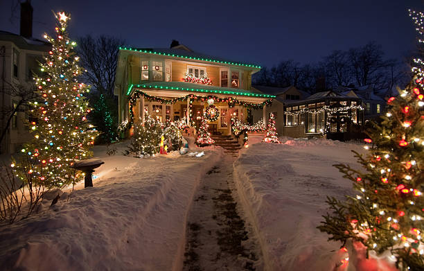 Old Historic Home with christmas lights Old Historic Home with christmas lights and snow christmas lights house stock pictures, royalty-free photos & images
