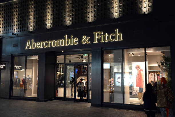 Abercrombie & Fitch in Beijing, China at night Beijing, China - November 11, 2017:  People shop at night at the Abercrombie & Fitch, an American retailer, in the Sanlitun district known for its international chain stores. abercrombie fitch stock pictures, royalty-free photos & images
