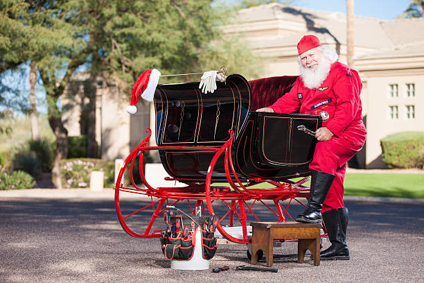 istock Real Santa Mechanic Working on Sleigh 171575123