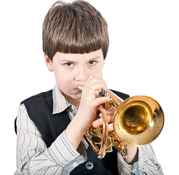 istock Young cute boyl with trumpet 171575240