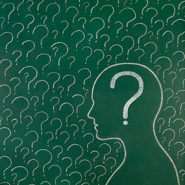 Human head and question marks Human head and question marks drawn on blackboard question mark people one person silhouette stock pictures, royalty-free photos & images