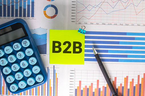 There is notebook with the word B2B. It is as an eye-catching image