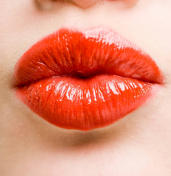 istock red lips blowing a kiss 171575826
