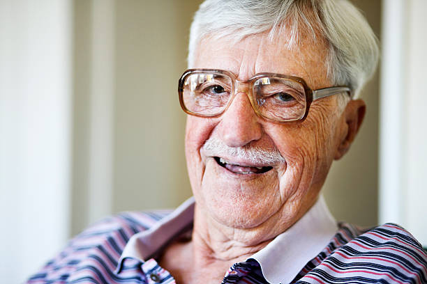 istock Happy old man in spectacles laughs 171575907