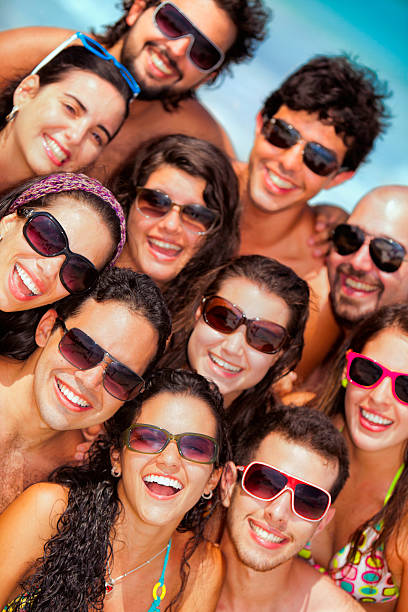 istock Group of young people with positive atitude on a beach 171575972