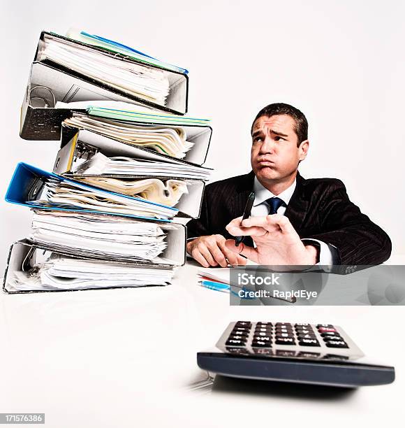 Phew Worried Businessman Eyes Enormous Work Pile Nervously Stock Photo - Download Image Now