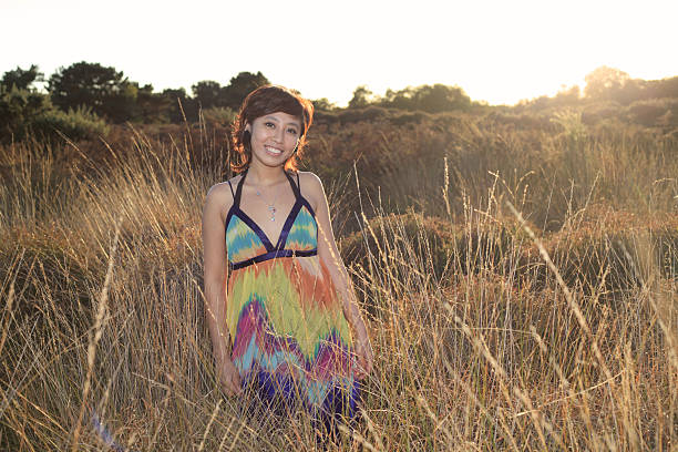 Girl in the wild on a late summer evening