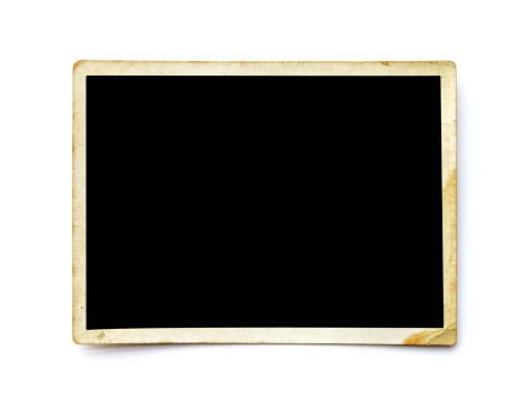 Closeup of a Antique photograph isolated on white.