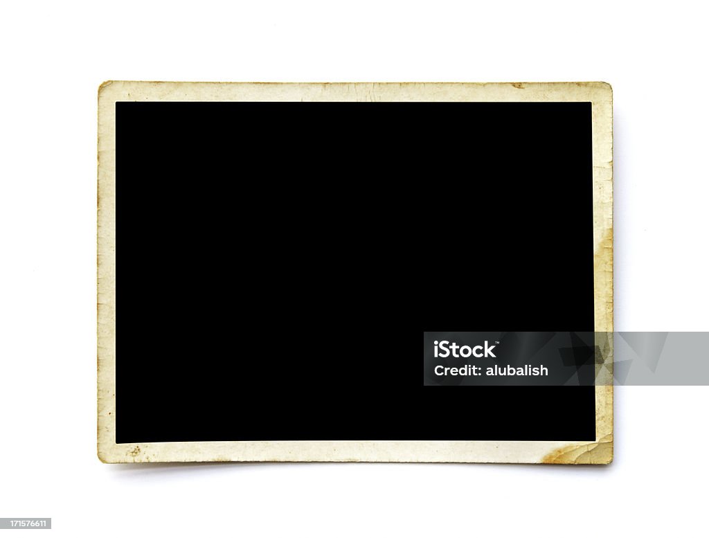 Old Photo Closeup of a Antique photograph isolated on white. Photograph Stock Photo